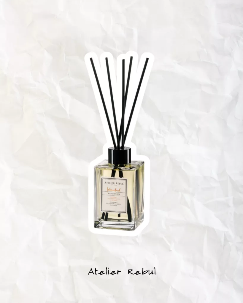 Atelier Rebul reed diffuser bottle styled as elegant home fragrance décor.