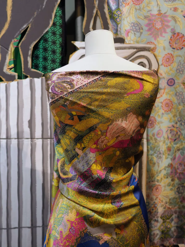 Silk shawl on a mannequin inside Wolff & Descourtis shop in Paris