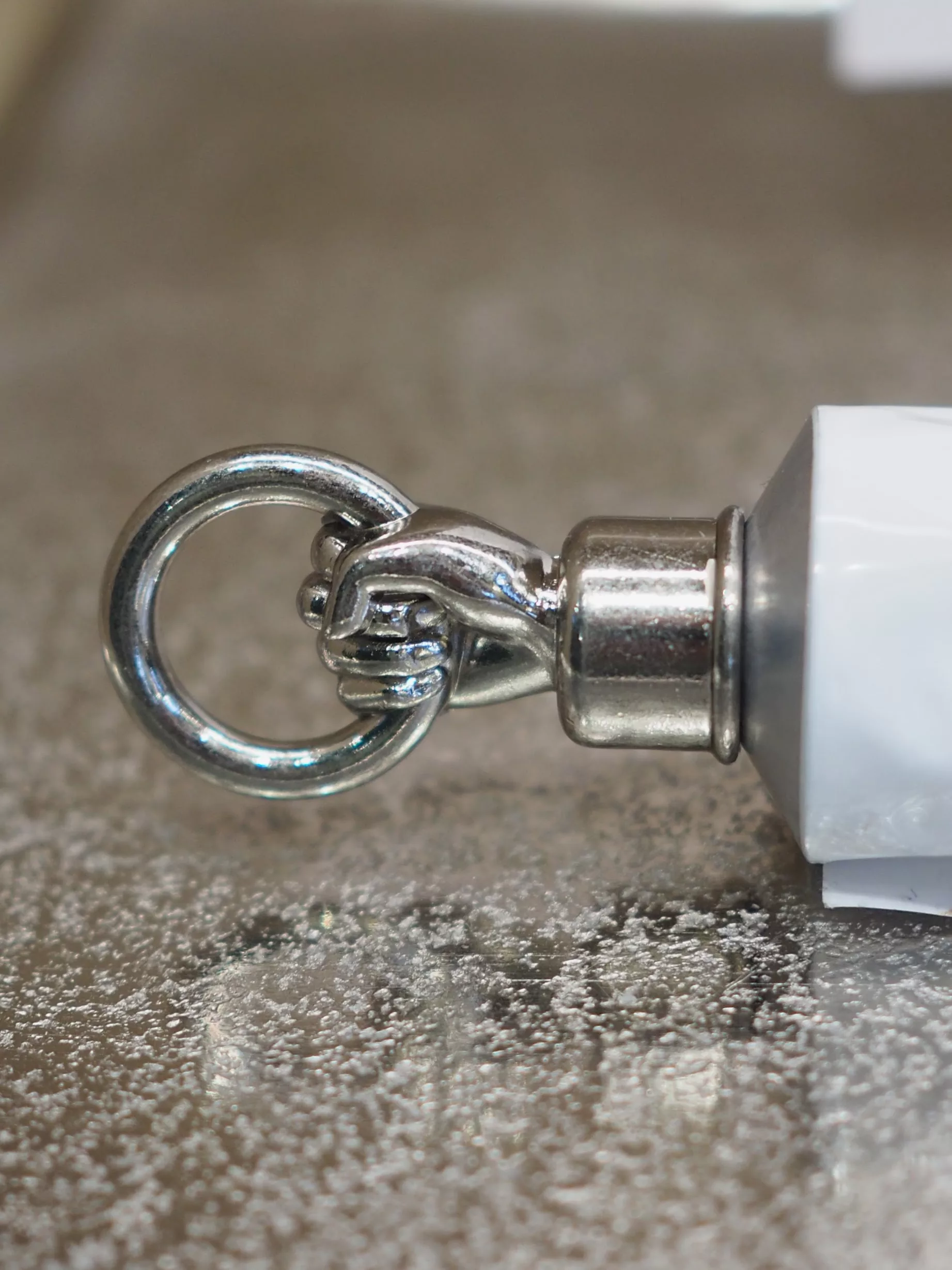 Silver plated detail from hand cream Pouchard
