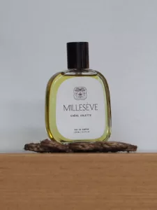 The bottle of Millesève perfume Chère Colette